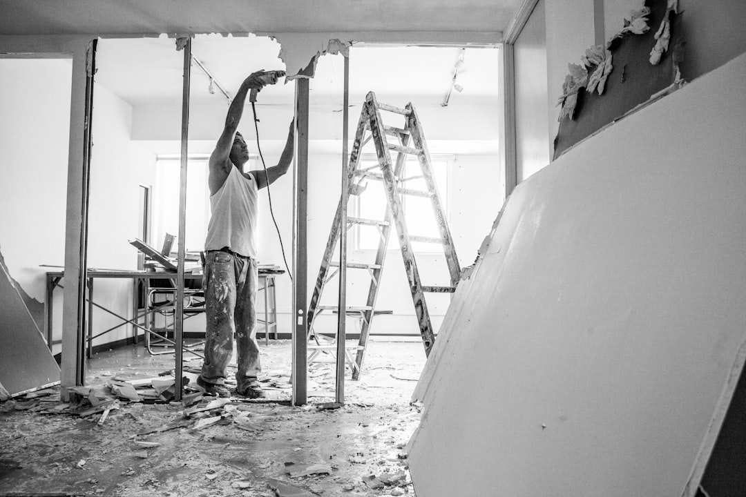 Builder working on construction site.
